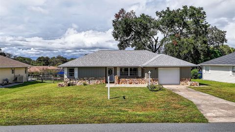 Photo of 553 W Buttonbush Drive, Beverly Hills, FL 34465 (MLS # TB8429236)