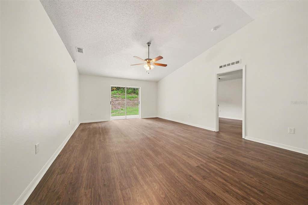 Photo of 909 Bristle Cone Court, Minneola, FL 34715 (MLS # O6425062)