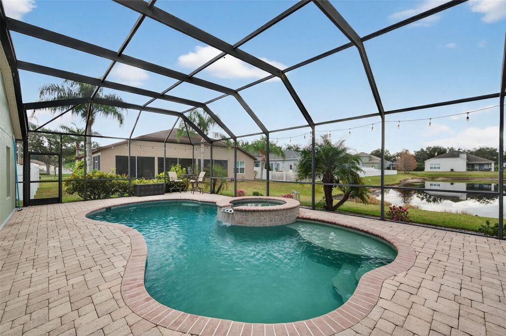 Photo of 20828 Woodvale Lane, Land O Lakes, FL 34638 (MLS # TB8461690)