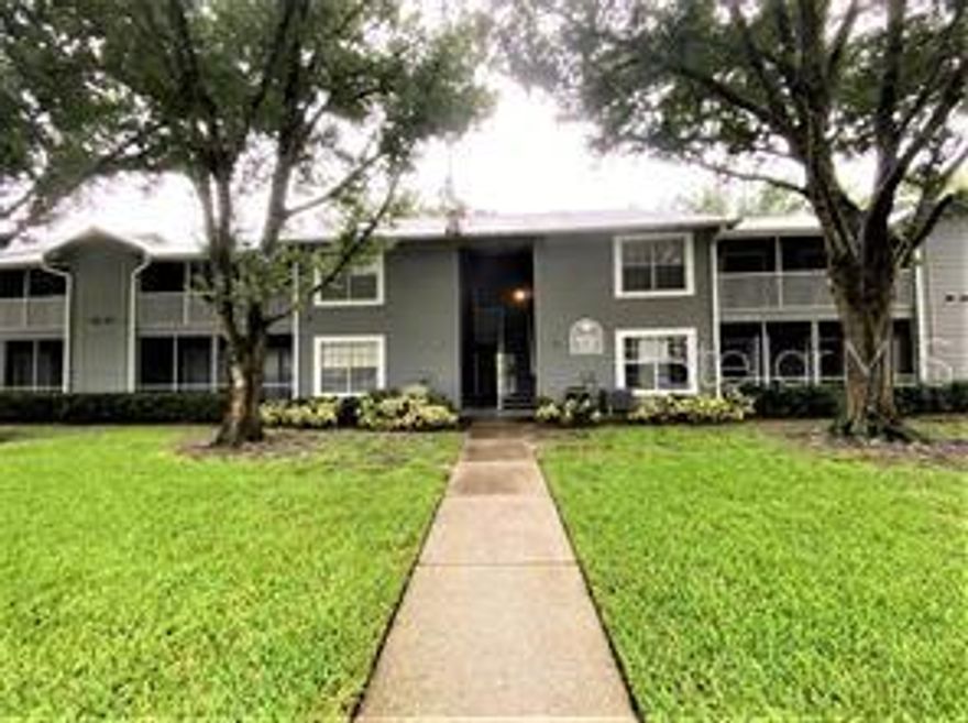 The ever desirable Raintree Manor community! This 1st story unit sits privately nestled with views overlooking a quaint pond and nature walk. The master suite has sliding glass doors that open to the private, screened porch and a spacious walk in closet. The second bedroom is set apart for privacy and has its own walk in closet. The open floor plan has an entertainment-sized living/dining room area. You will fall in love with this park-like community with beautiful mature trees, ponds, swimming pools, great community center, tennis court and picnic areas. Desirable location near county parks, restaurants, shopping, USF, hospitals, Busch Gardens, Adventure Island, MOSI, and a short drive on nearby I-75 or I-275 to Downtown Tampa, Tampa International Airport, and other Florida attractions.