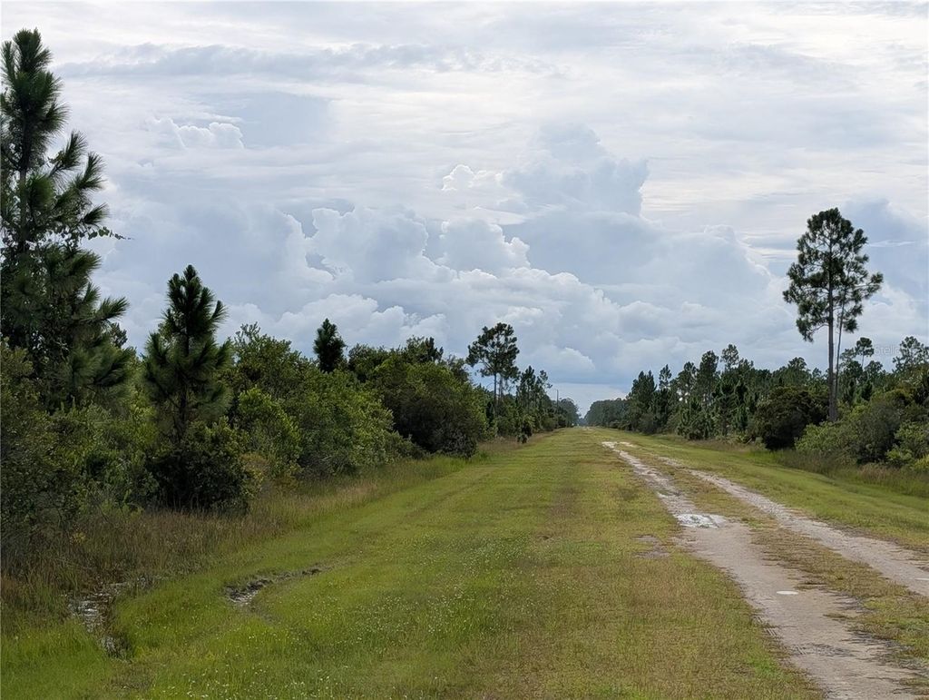 Photo of 213 Belmonte Drive, Indian Lake Estates, FL 33855 (MLS # TB8415350)