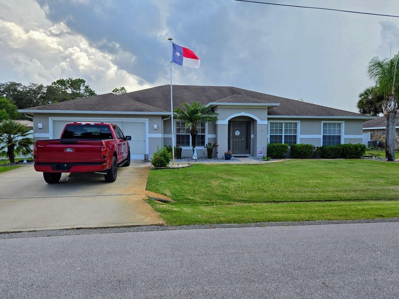 MUST SEE! This beautifully maintained 4-bedroom 2 bath heated saltwater pool home is being offered together with adjoining lot creating a rare double-lot estate in one of Palm Coast's most desirable neighborhoods. The entire property is fully fenced providing a private sanctuary, perfect for relaxed family living, pets or entertaining.
Step inside to find a bright, open floor plan featuring spacious living and dining areas, high ceilings, and plenty of natural light. The kitchen is centrally located, overlooking the pool and patio, making it ideal for both everyday living and hosting gatherings.
The primary suite offers comfort and privacy with an en-suite bath, while three additional bedrooms provide room for family, guests, or a home office.
Outdoors, enjoy your heated pool with stunning evening lighting transforming the backyard into a resort-style oasis for a true Florida lifestyle retreat.