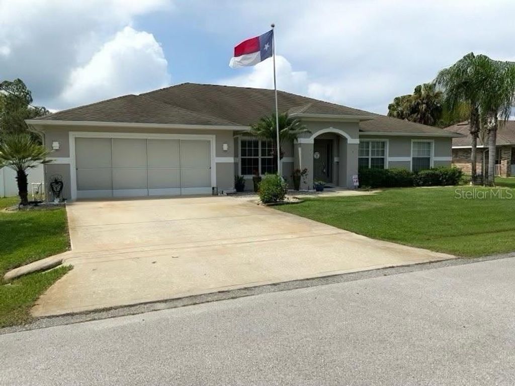 Photo of 7 Bickshire Ln, Palm Coast, FL 32137 (MLS # FC312013)