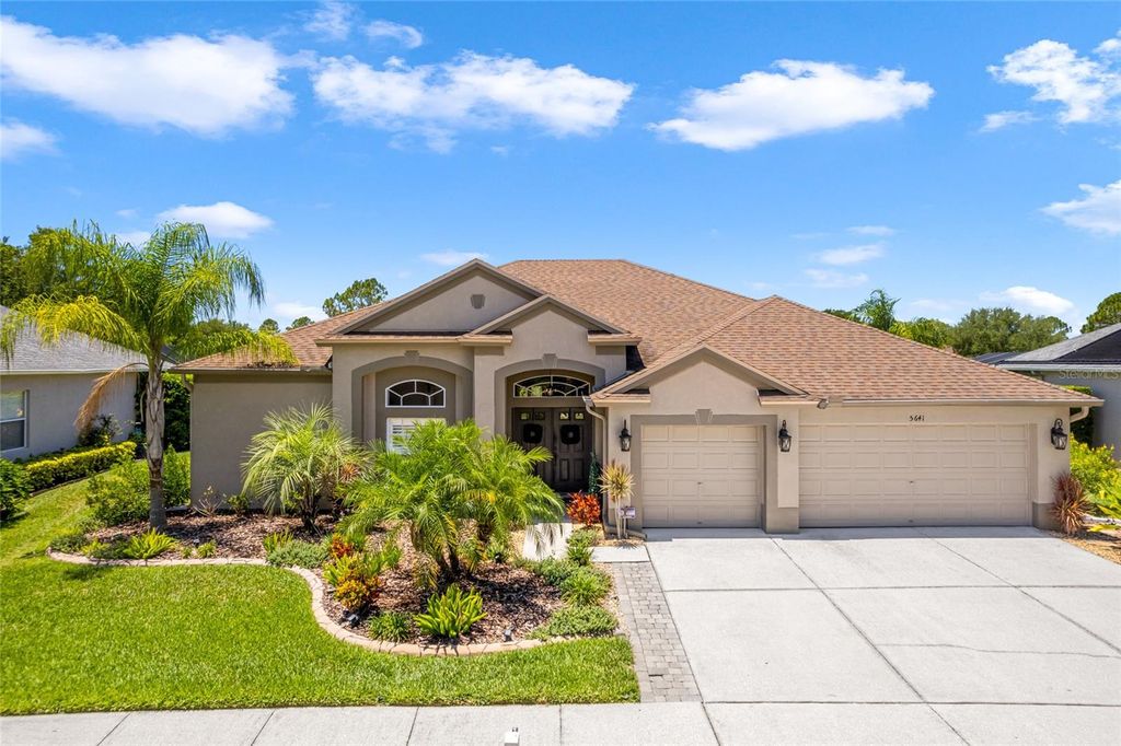 Photo of 5641 SPECTACULAR BID DRIVE, WESLEY CHAPEL, FL 33544 (MLS # T3449464)