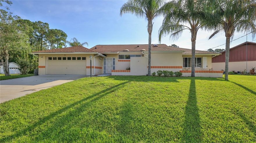 Spacious Home in the Pine Lakes -W Section of Palm Coast with a Split Floor Plan, Decorative Windows and Vaulted Ceilings! Updated with Newer Kitchen with Granite Countertops & Beautiful Bathrooms & Floors Throughout! This Lovely 9 Room Home Features a Large Living Room, Dining Room, Galley Kitchen with Dinette, Family Room, Courtyard Style Study with French Doors, Sliding Glass Doors to the Enormous Screened in Lanai, Laundry Room, 2 Car Attached Garage and Unique Windows & EnclosedCourtyard Spaces for a Sunny & & Bright Home. New 5 Ton Air Conditioning System January 2023, New Roof August 2022- Receipts in Documents. This Beautiful Home Offers the Best Florida Lifestyle, only 7 Miles to the Pristine Atlantic Beaches and Set on the 125 Miles of Connection Bike / Jog Trails, Close to Shopping & Schools & Golf at the PineLakes Golf Course (brochure attached) Located 25 Miles South of St Augustine, and 30 Miles North of Daytona Beach in the Hidden Gem City of Palm Coast!