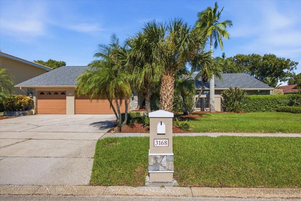 Photo of 3168 Masters Drive, Clearwater, FL 33761 (MLS # TB8557801)