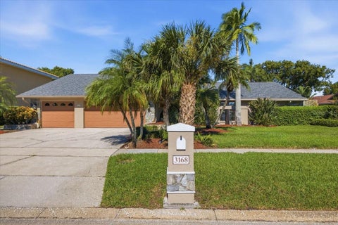 Photo of 3168 Masters Drive, Clearwater, FL 33761 (MLS # TB8557801)