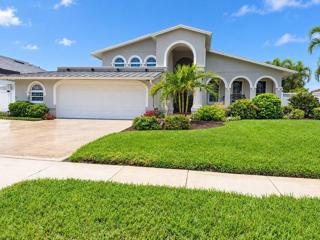 Photo of 707 Snug Island, Clearwater Beach, FL 33767 (MLS # TB8554968)
