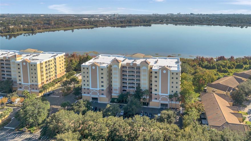 BREATHTAKING LAKE VIEW WITH PRIVATE BALCONY!! Enjoy Florida living in luxurious style.
This beautiful condo has an amazing view of the lake located in the heart of Metrowest within the gated Promenade community, offers a rare opportunity to own a stunning home with gorgeous views of Turkey Lake. Situated on the 4th floor, this condo provides exclusive, private views from both the living room and master bedroom, with a spacious patio to enjoy anytime of the day and evening. It's the only condo stack in the building with this unique layout and a totally private balcony. The condo is filled with natural light with high ceilings. It has a living and dininng room combo leading to a huge patio.The spacious kitchen has granite counter tops and stainless steel appliances. The master suite boasts a huge bathroom with both a shower and a spa tub, the third room can be used as a den or office. 
New A/C 2024, Refrigerator 2023, Dishwasher 2023. Washer and New Dryer 2025 are included.
Includes a covered garage space. Residents of the Promenade community enjoy lush landscaping 24/7 security, access to a community resort style pool, gym clubhouse, and a scenic fishing pier. The building is secured with entry access codes for your peace of mind. The beautifully lit-up fishing pier, with a cabana space, provides the perfect place to enjoy fresh air and lake views. Enjoy seasonal boat races and capture morning sunrises and evening fireworks from Universal Theme Park and Disney World right from the comfort of your home! Prime Location this condo is surrounded by local cafes, fine dining, restaurants, only minutes from Valencia College and shopping, with only a 15-minute drive to downtown Orlando. Whether you’re searching for your next home or a solid investment opportunity, this MetroWest condo checks all the boxes. 
 This is truly a GEM! Don't miss out on this rare opportunity to own this cozy home—make it yours today!