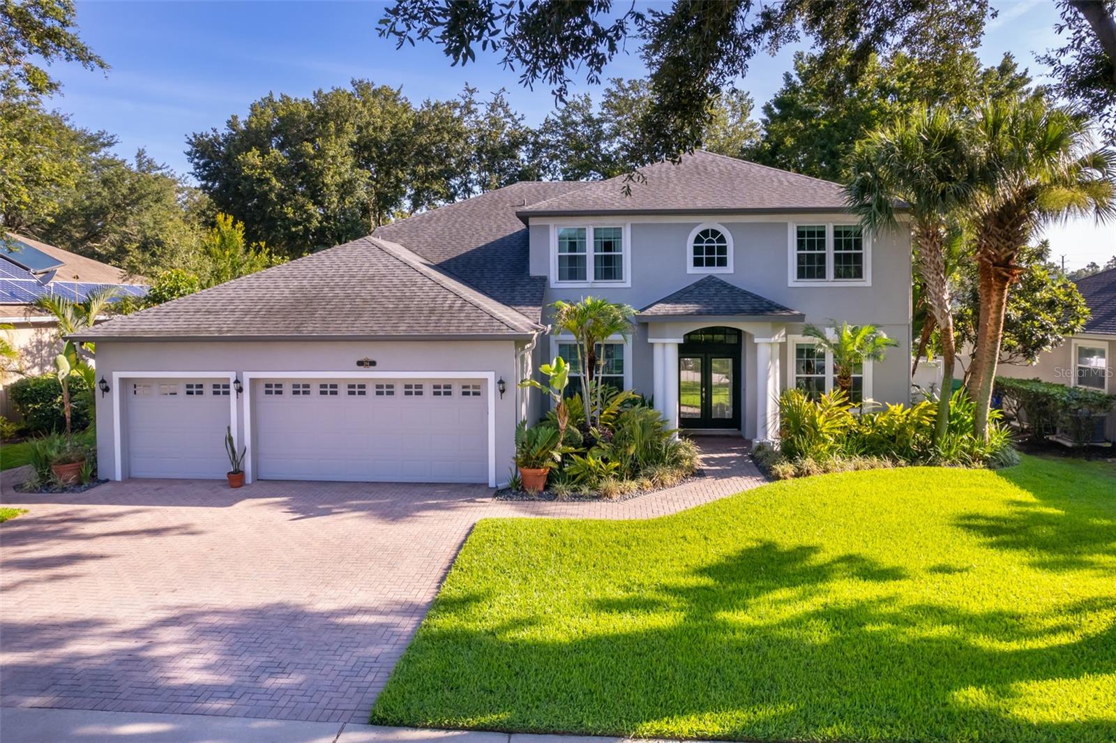 Nestled in the highly sought-after Lake Mary area, this 5-bedroom, 3-bathroom single-family home boasts over 3,250 square feet of thoughtfully designed living space. The open-concept floor plan features soaring ceilings (no popcorn in sight!), durable wood-look tile flooring on the main level, plush Burberry carpet upstairs, and abundant natural light throughout. The expansive kitchen is a chef’s dream, complete with quartz countertops, solid wood cabinets, a step-in pantry, pass-through window, stainless steel appliances, and a striking herringbone tile detail on the backsplash. The downstairs offers a guest bedroom with a full bathroom—featuring upgraded cabinetry—ideal for multi-generational living, visiting guests, or even a private home office. Conveniently located near the outdoor access, this bathroom is perfect for entertaining, al fresco dining, or accommodating a future pool or hot tub. Upstairs, you’ll find generously sized guest rooms, all with walk-in closets, as well as a massive primary suite for your own private retreat. The owner’s suite offers dual walk-in closets, a beautifully tiled, light-filled walk-in shower, a relaxing garden tub, dual sinks, and a private water closet—creating a true spa-like retreat. The upstairs guest bathroom offers dual sinks and upgraded modern tile in the shower-tub combo—ideal for busy households. Additional features include an expanded enclosed lanai with beautiful slate tile flooring (2020), an inside laundry room with a window and custom blinds, updated toilets, newer custom blinds throughout, an extensive under-the-stairs storage area, and two A/C units for year-round comfort (downstairs unit replaced in 2022, upstairs unit in 2019). Step outside to enjoy a fully vinyl-fenced yard (2022), an extended paver patio, creating a beautifully landscaped outdoor entertaining space—complete with a grill area and tall French doors that seamlessly connect indoor and outdoor living. A sandbox area offers potential for a garden or play zone, and a 3-car garage with a paver driveway adds both function and curb appeal. This spacious and beautifully upgraded home offers a peaceful suburban lifestyle in the highly desirable Lake Mary area, with easy access to top-rated Seminole County schools, popular shopping and dining destinations, and major roadways like I-4 and the 417—ensuring a seamless commute in Central Florida and beyond. Outdoor enthusiasts will appreciate the abundance of nearby parks, scenic trails, and recreational options, including the historic Mayfair Golf Course, which is currently undergoing an exciting transformation with a brand-new clubhouse underway. The area is also poised for even greater convenience with a soon-to-be-built medical plaza just minutes away. Situated in a well-established neighborhood with a reasonable HOA, this property strikes the perfect balance of comfort, style, and location. Surrounded by a vibrant, growing community and filled with thoughtful upgrades throughout, this Lake Mary gem is truly ready to welcome you home.