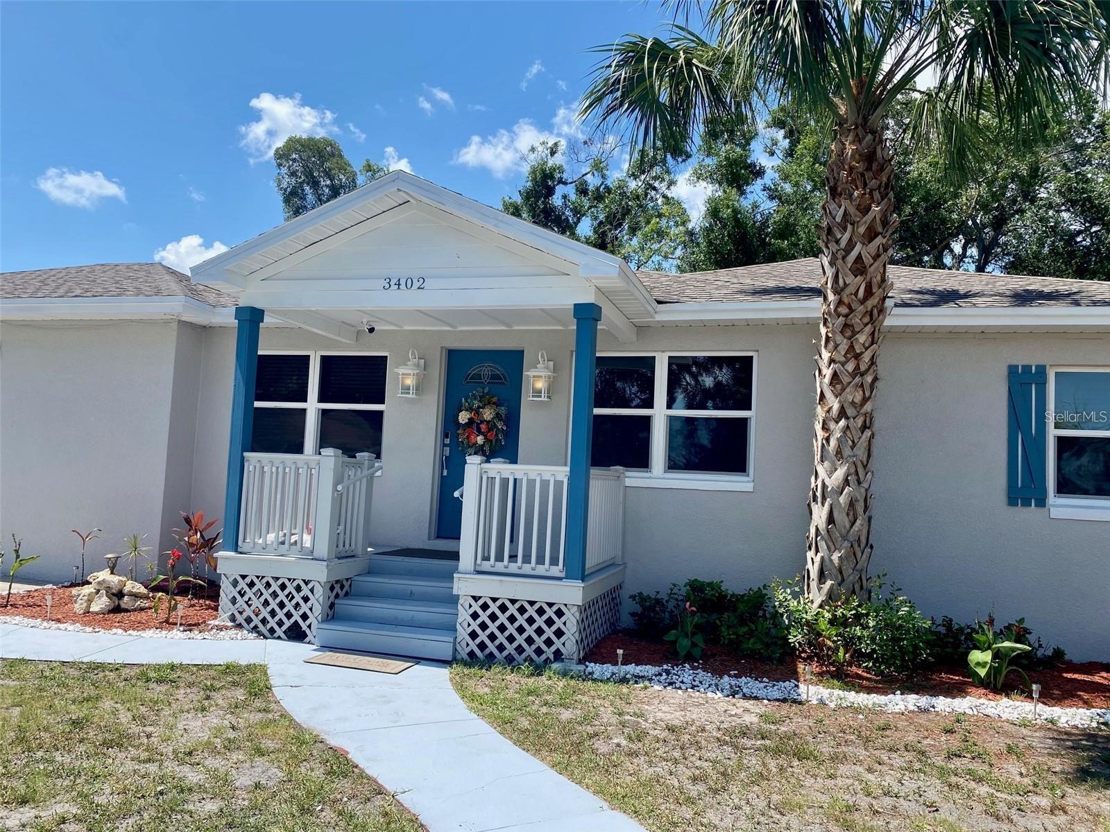 Beautifully updated West Tampa home has everything you need. Fall in love with the beautiful front porch, the bright and open feel of the home, and the LED recessed lighting throughout the home. Any chef, experienced or novice, will enjoy preparing meals in this modern and open kitchen that features soft closing wooden cabinets, subway backsplash, huge prep island, full set of stainless steel appliances, and beautiful granite counter tops. The oversized master ensuite features a gorgeous bathroom with dual shower heads and sinks, no more fighting over who's brushing their teeth first. The master's walk-in is sure to accommodate any fashionista's wardrobe. The home also features modern German engineered laminate flooring throughout and porcelain tiles in the wet areas. Along with the home's upgrades includes new doors and hardware throughout, 6" wood baseboards, and the list goes on. Large double lot and nicely fenced in.