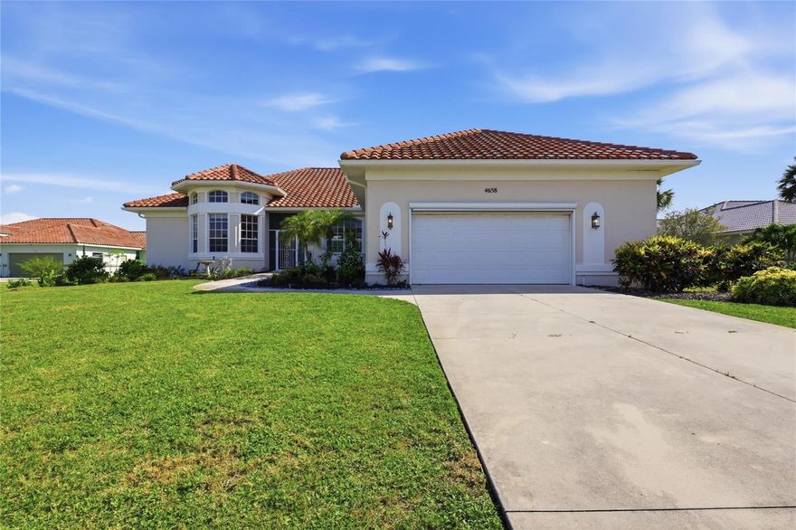 One or more photo(s) has been virtually staged. Waterfront living at its finest on beautiful Amberjack Creek! This beautifully remodeled 3-bedroom, 2.5-bath home is situated on an oversized waterfront lot and offers the perfect blend of comfort, space, and Florida lifestyle. Featuring a spacious split-bedroom floor plan with both a great room and separate family room, this home is designed for relaxing and entertaining alike. Terracotta tile flows throughout the living areas, while the newer open kitchen boasts an island, abundant cabinet space, a wine refrigerator, and seamless access to the living and dining spaces.
The den/office offers flexibility and could easily serve as a fourth bedroom. Triple sliding glass doors open to the oversized screened lanai with a sparkling pool, creating an ideal indoor-outdoor living experience. Enjoy waterfront views and easy boating access from the wood dock complete with power and water. Additional highlights include a sprinkler system, oversized 2-car garage with workbench, newer A/C, and plenty of storage throughout. This exceptional waterfront property is ready to enjoy!