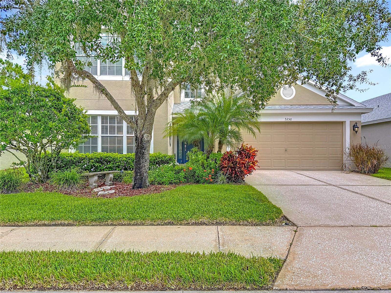 Welcome to this beautifully updated 3-bedroom plus office home perfectly situated on the golf course. From the moment you step inside, the soaring two-story foyer creates a grand first impression, opening into spacious living areas filled with natural light. The heart of the home features a gourmet eat-in kitchen with sleek quartz countertops, modern finishes, and plenty of space for cooking and entertaining. The open layout flows seamlessly to the large covered and screened lanai, the perfect spot to relax with a book or host gatherings while enjoying serene golf course views. Spacious living and dining areas feature stylish newer Pergo "waterproof" laminate flooring, blending beauty with low-maintenance ease. The thoughtfully designed floor plan showcases the private primary bedroom with attached luxurious bathroom featuring quartz countertops with double sinks, soaking tub and separate shower as well as an expansive walk-in closet. The separate office off the living room makes a great space for working from home or a hobby room. In the front of the home a secondary bedroom has an attached full bath that can also be accessed from the hall for guests. Upstairs the third bedroom is tucked away with it's own attached full bathroom and a surprise walk in closet at the top of the stairs is great for extra storage. Whether you like to golf or just enjoy watching, you will appreciate the beautiful views this home has to offer. Located in the small gated Remington Village, this community enjoys it's own private pool just steps away from your front door. Low maintenance living with the exterior taken care of for you means more time for you to play. This exceptional home combines modern elegance, functional design, and a coveted golf course setting, delivering the very best of Florida living. In addition to the golf course, Lexington Oaks offers a gym, community pool, playground, basketball and tennis courts. So close to shopping, restaurants, the Krate and a new Super Target (opening soon), you won't have to wander far from home. Hurry and see this one today before it's gone tomorrow!