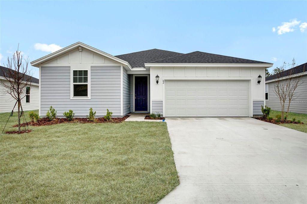 Photo of 62 Wandering Creek Way, Palm Coast, FL 32164 (MLS # FC316336)
