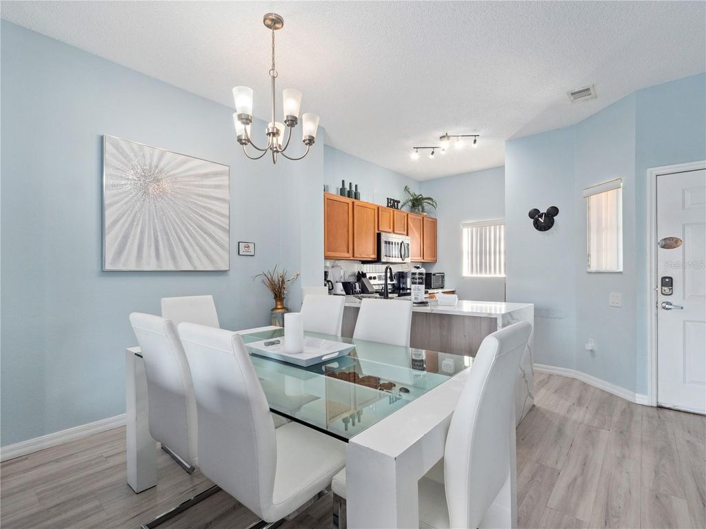 Photo of 136 Pompano Beach Drive, Kissimmee, FL 34746 (MLS # O6408419)