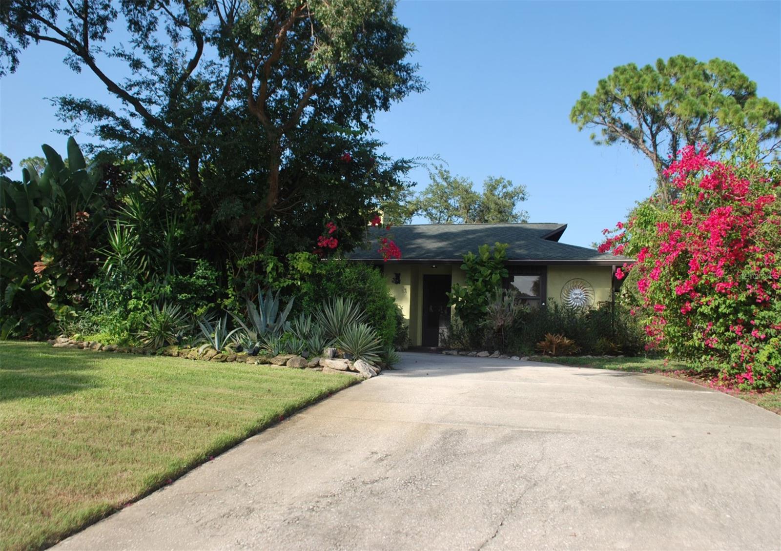 THIS HOME HAS CHARACTER & STYLE THAT YOU WON'T FIND IN A NEW HOME. SPLIT FLOOR PLAN. DOUBLE SIDED WOODBURNING FIREPLACE FACING THE DINING AND FAMILY ROOMS. SUNKEN LIVING ROOM OPEN TO THE KITCHEN PROVIDES AN OPEN AIRY ATMOSPHERE. NICE LANDSCAPING PROVIDES PRIVACY. UPDATES INCLUDE STAINLESS STEEL APPLIANCES, NEW FLOORING AND LUXURY VINYL PLANK FLOORING. IMPACT WINDOWS PROVIDE SECURITY DURING STORMS. SITTING ON A HIGH LOT WHERE FLOODING HAS NEVER BEEN AN ISSUE. ALL MAJOR COMPONENTS ARE UPDATED.