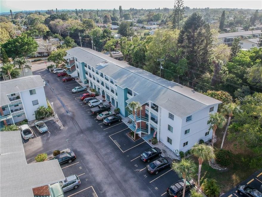 Priced to Sell!! Charming 2-bedroom 1-bath 55+ (partially furnished) condo located in the very desirable community of Second Bayshore.  Many upgrades... 2024 HVAC... the kitchen was recently opened up & tastefully updated, the bathroom was beautifully updated with a step-in shower & all new tile, newer laminate and carpet, new double-paned double-lock windows & a high-quality slider installed, and so much more... BONUS!! IN-UNIT WASHER/DRYER... Low monthly maintenance fee of just $356.  Owner parking is conveniently located near the elevator. This home is just right for easy upkeep and perfect for that Florida getaway.  When you're not lounging on your lanai, you can join in on the many seasonal activities taking place in the community...Just 8 miles away from the sandy beaches of Anna Maria & 20 minutes to SRQ.  Ideally located just a short drive from great shopping centers, including a brand-new Publix, a TJ Maxx, and a Target, almost everything you need is just a short distance away.  Milestone is presently being completed, so the seller is also offering $3,000 toward "possible" upcoming improvements.  Schedule your showing today!