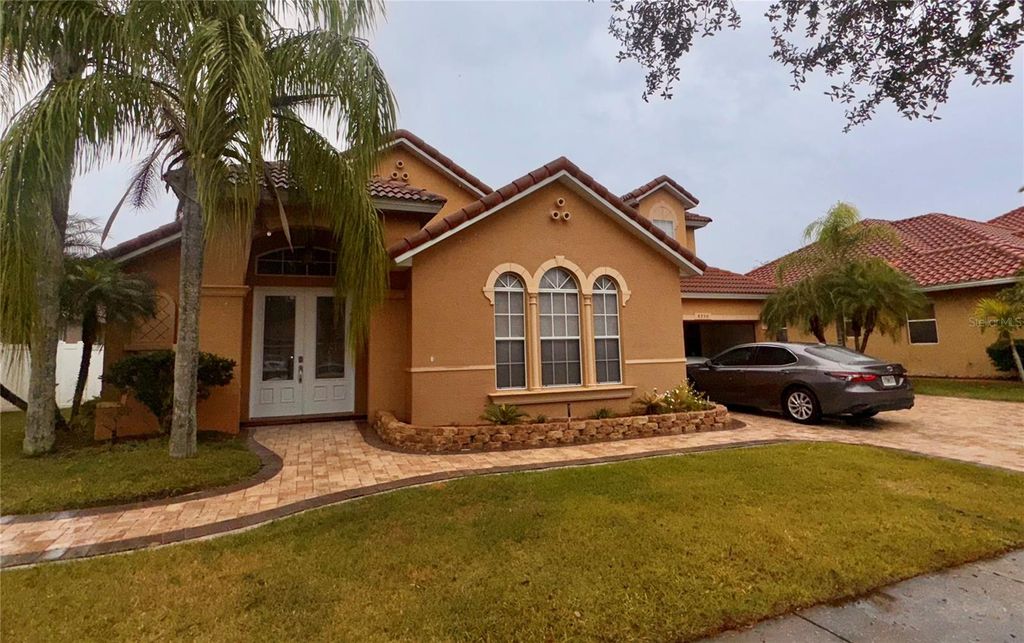 Photo of 8950 Tuscan Valley Place, Orlando, FL 32825 (MLS # O6372430)