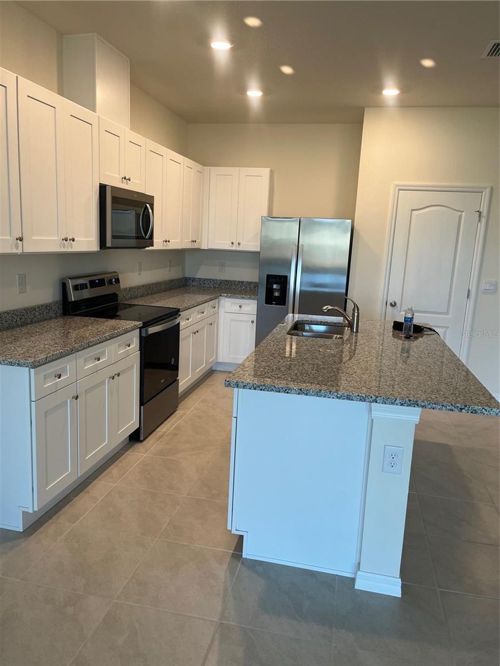 Photo of 1242 Lido Drive, Howey In The Hills, FL 34737 (MLS # O6399587)