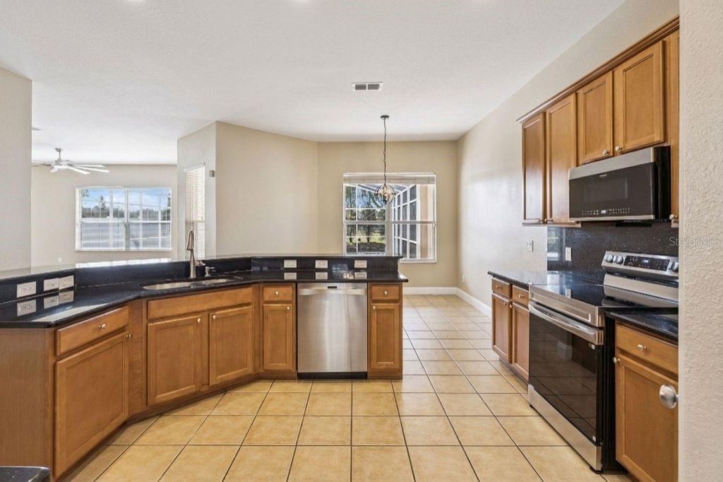 Photo of 5160 Terra Vista Way, Orlando, FL 32837 (MLS # S5144755)