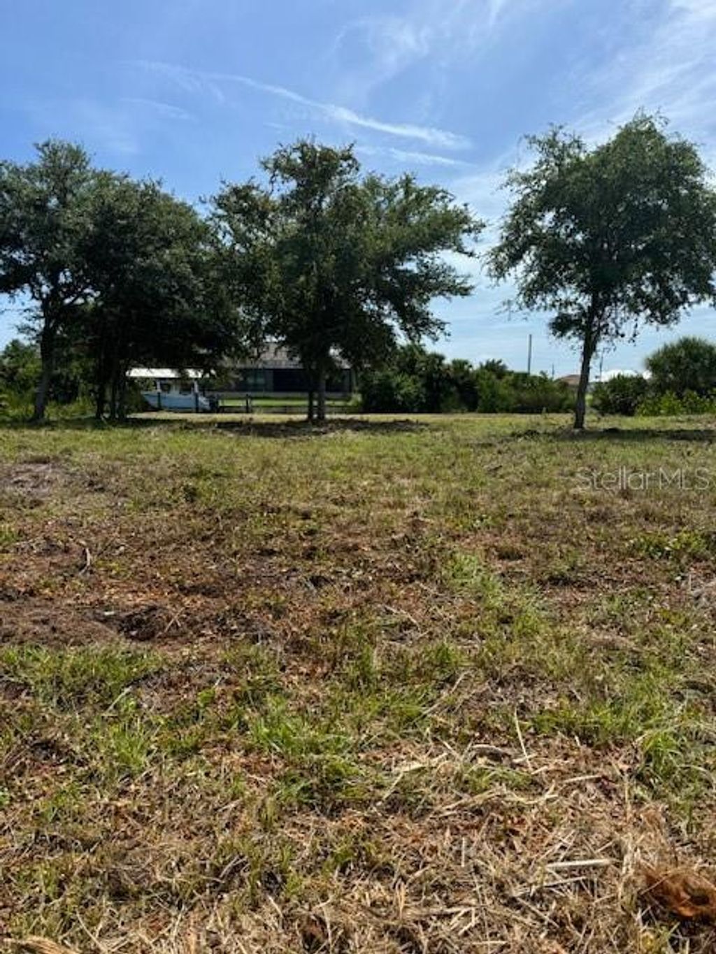 Photo of 10490 Winnipeg Street, Port Charlotte, FL 33981 (MLS # O6282757)