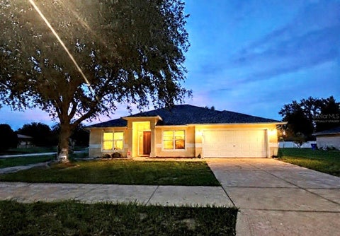 Photo of 1104 Stratton Avenue, Groveland, FL 34736 (MLS # O6420892)