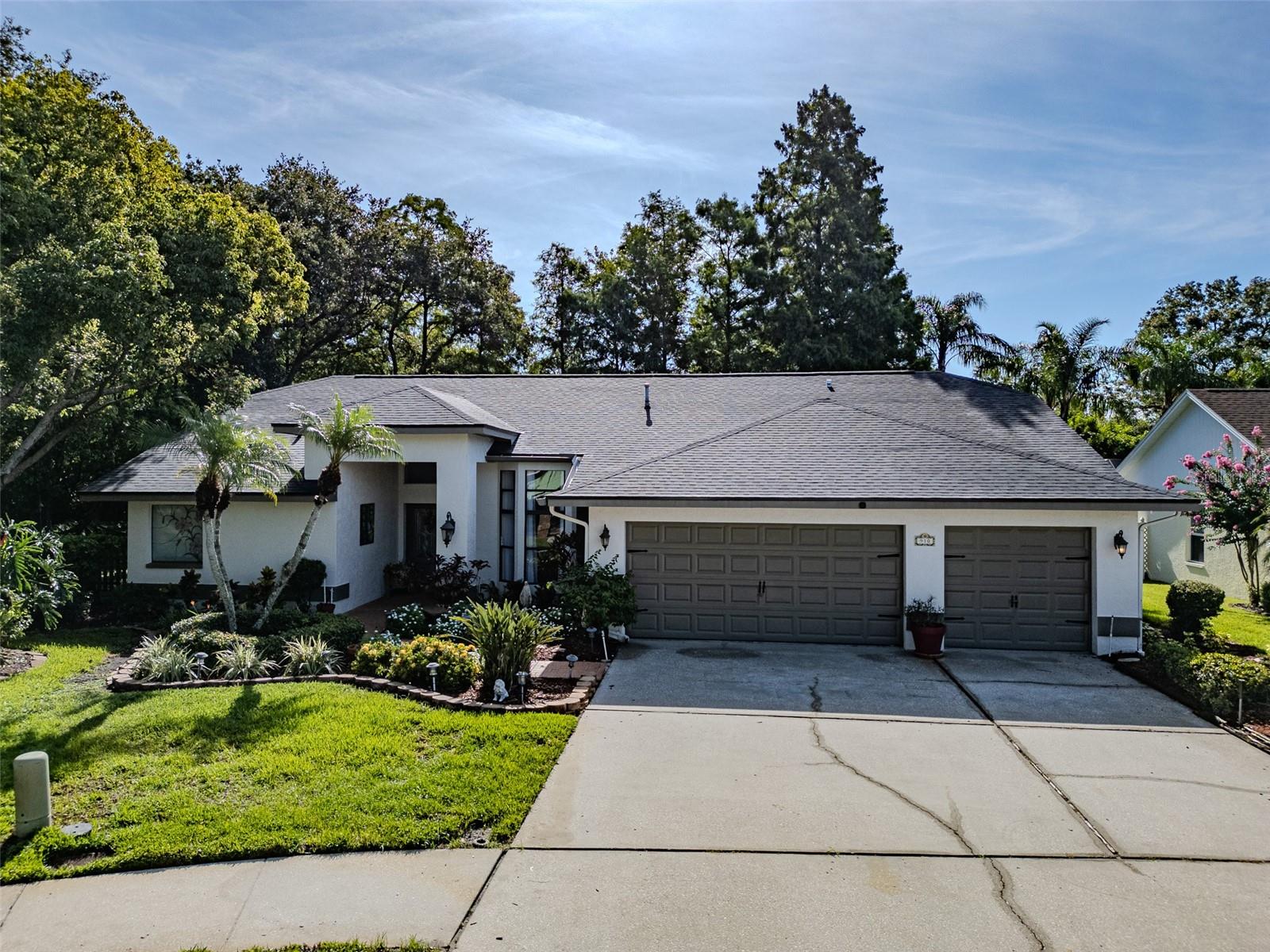This home is a spectacular one story, single family executive retreat in the heart of Safety Harbor. It is located in the highly desirable Huntington Trails neighborhood and nestled on a cul-de-sac lot with over 1/4 acre of rear privacy and a completely fenced in yard. Featuring 4 expansive bedrooms, 3 full baths, a gourmet kitchen, a screened lanai and an oversized pool and a 3 car garage. The list of recent upgrades is extensive. NEW A/C 2025, NEW carpet 2024/2025, NEW water heater 2024, popcorn ceilings removed 2024, NEW ROOF 2023, NEW dishwasher 2023, a NEW electrical panel 2022, exterior paint 2021, a complete master bathroom remodel in 2020 and more! Soaring ceilings and spacious rooms abound. Lushly landscaped and meticulously maintained. This treasure is ready for immediate occupancy. One or more photos have been virtually staged. Make an appointment today!