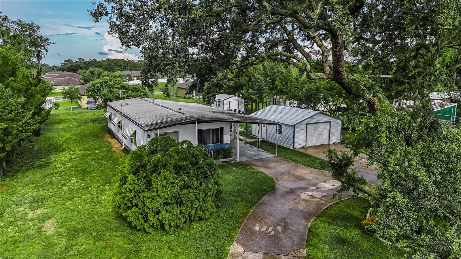Leesburg - Investor Special or First-Time Buyer Opportunity! This spacious 3-bedroom, 2-bath manufactured home sits on a generous half-acre lot and offers endless potential. Featuring a large living room perfect for entertaining or relaxing, this home is ready for your personal touch. A detached garage provides secure parking or workshop space, while the separate storage shed adds extra room for tools, toys, or hobbies. With plenty of yard space and no HOA, this property is ideal for investors looking to expand their portfolio or first-time buyers seeking space and value. Don’t miss this chance to own a slice of country living with city convenience nearby!