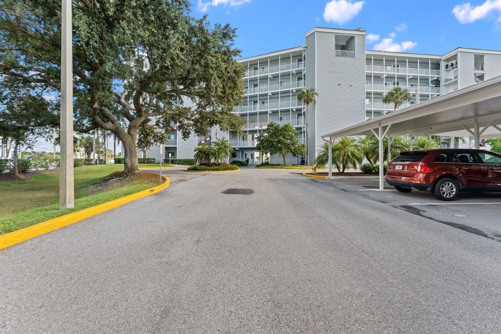 Photo of 610 Island Way #408, Clearwater, FL 33767 (MLS # TB8548807)