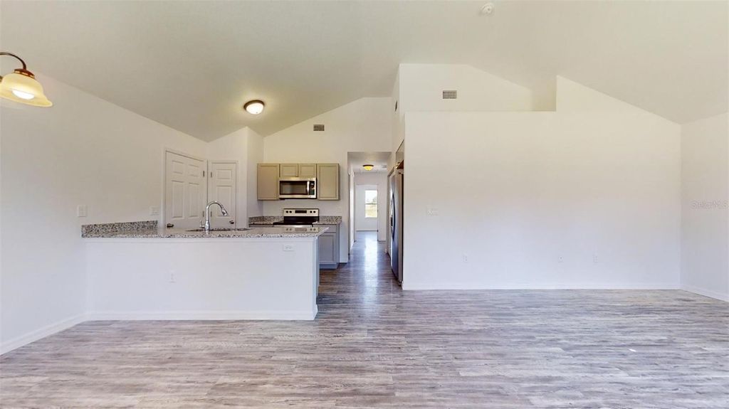 Photo of 4083 SE 130th Place, Belleview, FL 34420 (MLS # OM710874)