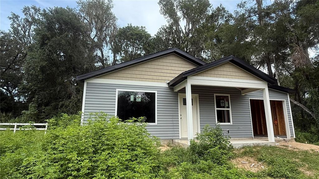 Photo of 4083 SE 130th Place, Belleview, FL 34420 (MLS # OM710874)