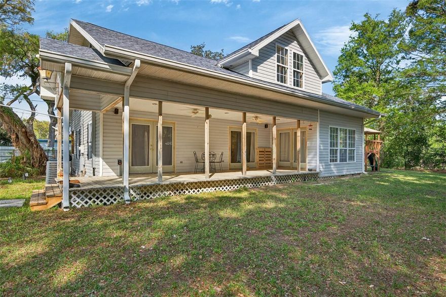 This truly unique waterfront home blends history, character, and functionality in a setting that is hard to replicate. Originally built in 1971 as a fishing camp, the home was thoughtfully expanded in 2002 with a second story addition, along with the current living room and porches, transforming it into a spacious family home with room to grow. Situated on a canal with access to Church Lake and the Tsala Apopka chain, the property offers direct waterfront living with the added benefit of being located directly across from the protected Flying Eagle Preserve, providing a natural backdrop of thousands of acres of untouched Florida wilderness with no rear neighbors. The home features 5 bedrooms, a large office, and 3 bathrooms, offering flexibility for families, guests, or work from home needs. The living room is positioned to take full advantage of the water views, creating a peaceful and inviting main living space. Just beyond, a large deck overlooks the canal, providing the perfect space to relax, entertain, or enjoy the natural surroundings and wildlife. Throughout the home, you will find warm wood finishes that add character and a true Old Florida feel. The kitchen has been updated with stainless steel appliances, and key improvements throughout the home include a new roof in 2023, updated electrical panel and wiring, an electric tankless whole house water heater, and separate air conditioning units for each story. The downstairs subfloor has also been replaced. Additional features include a downstairs laundry area with a laundry chute, a fully fenced yard with an electric gate, and close proximity to a public boat ramp located approximately 75 yards away, making water access quick and convenient. While the property is located in a flood zone, the home has never flooded and offers a transferable flood insurance policy currently at just $571 per year. This is a rare opportunity to own a waterfront home with space, updates, and direct access to nature, all while being surrounded by one of Citrus County’s most expansive conservation areas.
