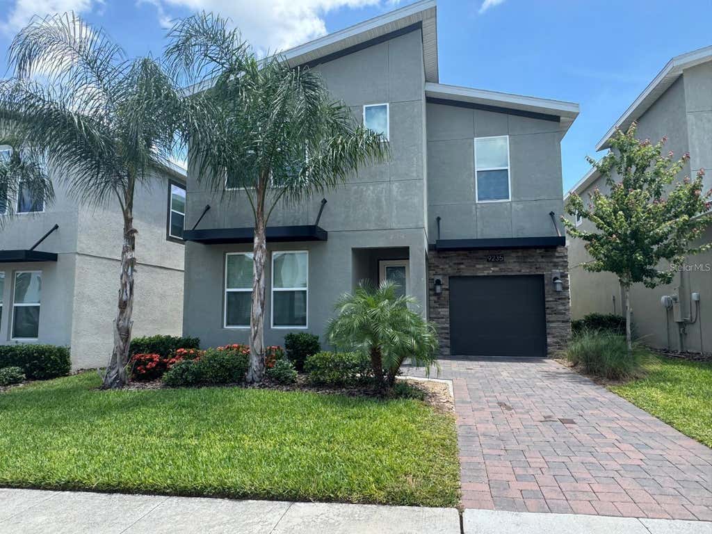 Photo of 9235 Sommerset Hills Drive, Davenport, FL 33896 (MLS # O6431337)