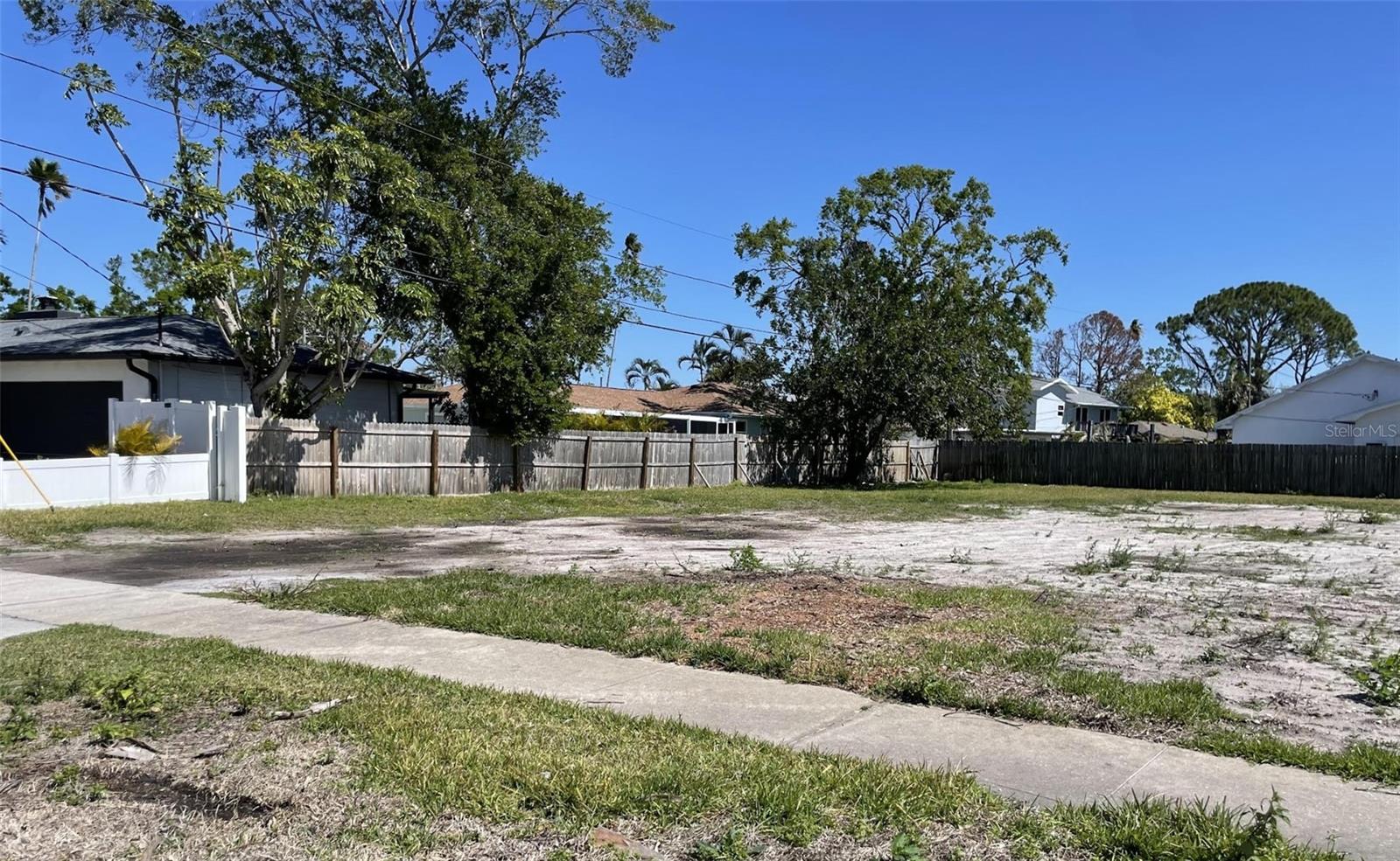 This ready-to-build lot at 1710 Bayou Grande Blvd, St. Petersburg, offers prime real estate on a deep 56 x 121-foot lot, approximately 6,800 square feet. Ideally located just 10 minutes from downtown St. Petersburg, the property is also close to two city-maintained parks. One park, located diagonally across the street, features a canoe ramp and provides direct access to Tampa Bay and Weedon Island, perfect for a refreshing kayaking adventure. The second park, Arrowhead Park, is just over a block away and offers a great space for leisurely walks and conversations. If you are considering new construction, this lot has the potential for water views from an elevated second story. The cleared interior lot is priced to sell and is ready for development.
