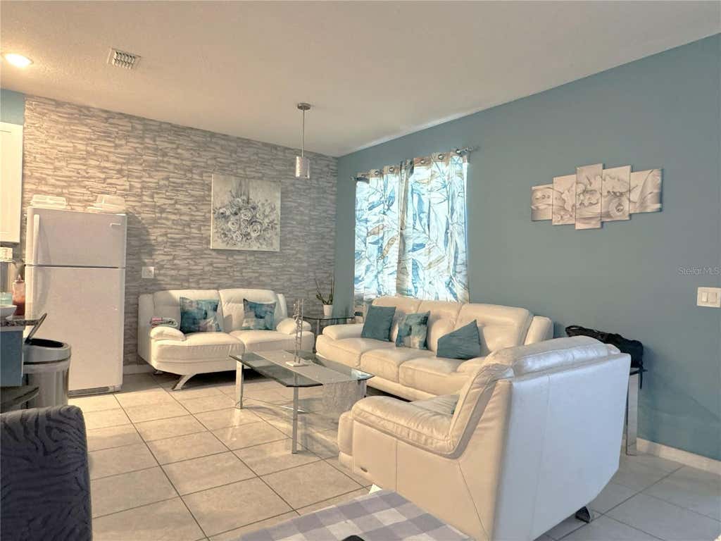 Photo of 239 Tarpon Bay Boulevard, Haines City, FL 33844 (MLS # S5149748)