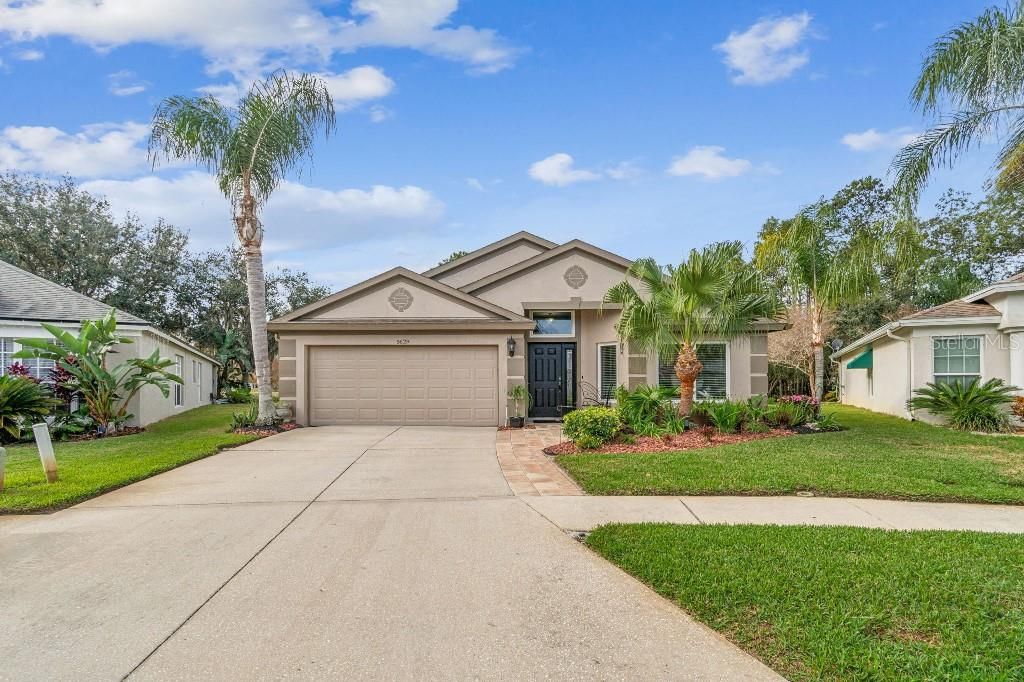 Photo of 5629 Grindstone Loop, Wesley Chapel, FL 33544 (MLS # TB8458791)
