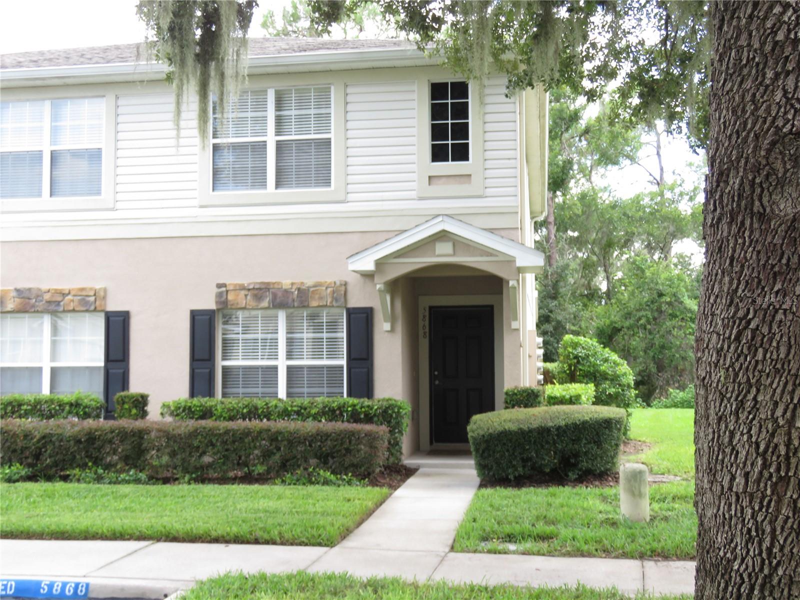 Super cute, clean and nicely upgraded two bedrooms townhouse with a third private room downstairs with French doors so could be used as office or guest room. Ceramic tile throughout downstairs, large living and dining combo. Kitchen has all appliances, plus sliding doors leading out the screened in lanai, with small storage closet. Upstairs has split floor plan with carpet in bedrooms, Master bedroom is large enough to easily accommodate a king size bed, also has private bathroom and walk in closet. Laundry closet located upstairs, full size washer and dryer included. Second bedroom has plenty of closet space. Ceiling fans throughout home. Downstairs has third bathroom which is a half bath. This home is vacant and clean and ready for move in. Call today to schedule a showing.