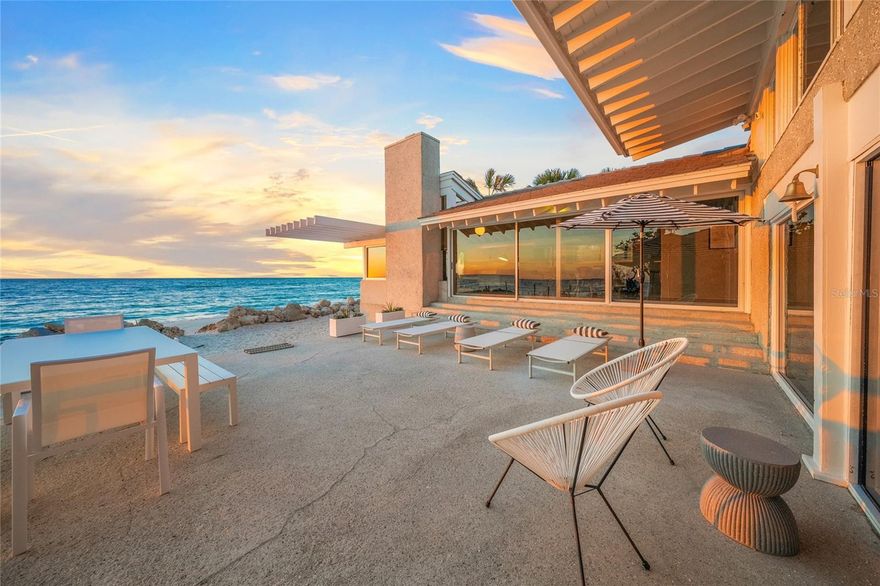 HOME RUN DEAL YOU CAN'T AFFORD TO MISS! CASEY KEY GULF FRONT MOVE-IN READY FOR UNBELIEVABLE PRICE! REDUCED 900K!  Iconic Gulf-front Mid-Century Modern gated residence on Casey Key embodies the true essence of casual coastal living, offering an unparalleled retreat for the soul. The moment you step through the door, a magical transformation takes place. Your senses awaken as you are immediately captivated by the breathtaking Gulf views stretching out in every direction. The shimmering turquoise waters serve as a stunning backdrop to daily life, drawing you into a serene connection with nature. The sound of gentle waves lapping against the shore harmonizes with a glimpse of manatees & dolphins gracefully swimming by, herons fishing as they walk along the shoreline, the calls of osprey & seagulls soaring above, creating an ambiance that feels almost otherworldly! Evening brings an even greater reward, as the sky ignites into vibrant colors with the setting sun, spilling a soft glow across the land, enveloping everything in a serene warmth & peaceful tranquility. If you seek a lifestyle offering a private paradise to escape with nature, fishing from your resident-owned private beach, tranquility, no high rises or traffic, yet everyday conveniences, this residence is the perfect fit! Designed in 1969 by the acclaimed architect Carl Abbott of the Sarasota School of Architecture, this move-in ready residence is nestled on over a half-acre lot with 100 feet of pristine Gulf Front & private beach. The residence features an open living concept that harmoniously blends indoor & outdoor spaces through the walls of glass. Amazing original features include vaulted ceilings with open beams, Tabby Shell walls, kitchen cabinetry, Mid-Century Modern furnishings, updated quartz kitchen countertops & stainless appliances, 4 bedrooms & 3.5 baths, which includes two primary suites. NEW INFRASTRUCTURE UPDATES include impact windows & doors, installing a whole house Generac, elevating the new HVAC systems & electrical service panels. With no public access to beaches within miles, you’ll relish the privacy Casey Key offers. Upon entering the electronic gate, it feels as though you have stepped into a nature sanctuary that soothes the spirit & rejuvenates the mind. Every element, from the lush tropical landscaping, which has auto lighting throughout, to the sound of the trickling fountain, to the seamless indoor-outdoor flow to the awe-inspiring views, works together to create a haven where time slows down & everyday worries melt away. The location just north of the historic Blackburn Point "swing bridge" offers easy on & off access to this magical island. Embrace the Island lifestyle, golf cart two blocks to the marina with boat storage & management, tiki bars, restaurants. Or cruise in your golf cart another 5 blocks to Publix, pharmacy & more. Just a few minutes to Downtown Sarasota, St Armand's Circle & The Island of Venice. Notably, Casey Key is the ONLY barrier island in the region with an expressway from Tamiami Trail to I75 creating easy access to I75 & all nearby airports, plus private air travel options available on The Island of Venice-10 minutes away. The allure of this locale is undeniable, as Casey Key Road was recently acclaimed the most coveted street nationwide, underscoring the status of this incredible barrier island.