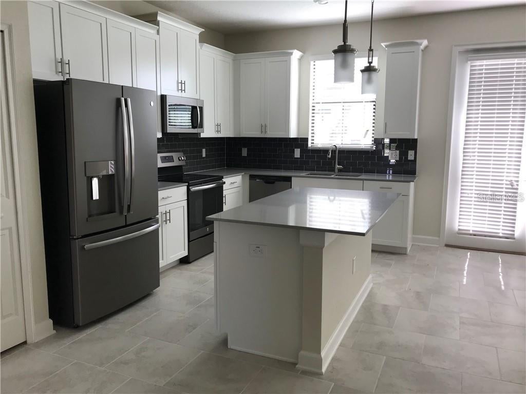 Photo of 11403 Whistling Pine Way, Orlando, FL 32832 (MLS # O6445232)