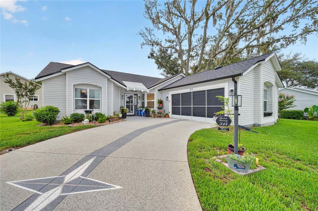 Photo of 313 Gonzales Place, Lady Lake, FL 32159 (MLS # G5115549)