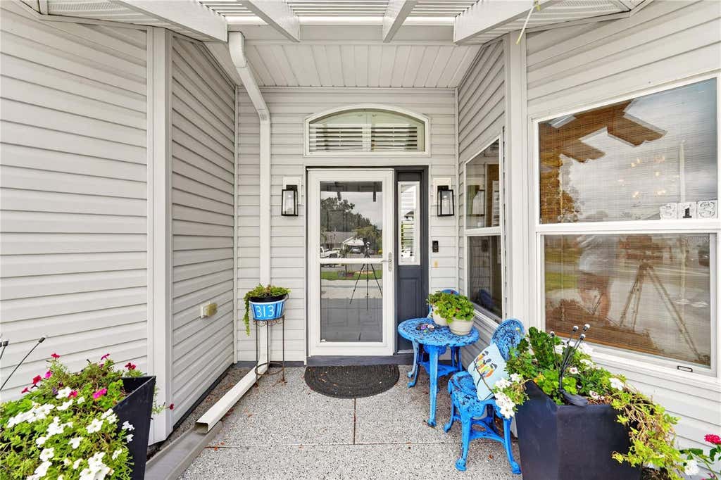 Photo of 313 Gonzales Place, Lady Lake, FL 32159 (MLS # G5115549)