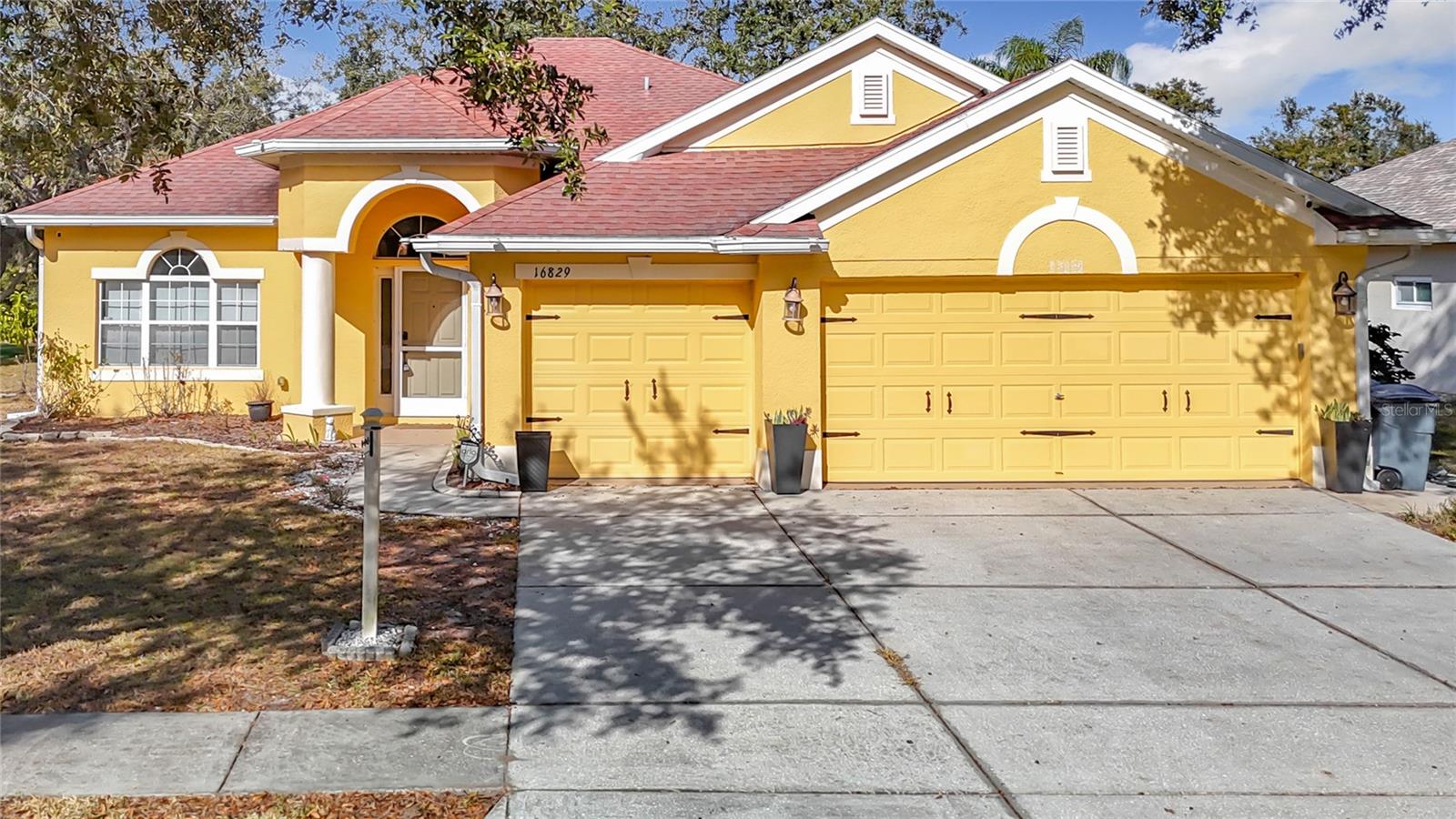 Welcome to his fully loaded 2,501 sq/ft, 4-bedroom, 3 bath, 3-car garage residence, in the desirable gated community of Quail Ridge. With beautiful walking/biking paths that run through the community, and just a 30-minute commute to Tampa International Airport, this stunner offers everything you’ve been searching for and more. Step inside to find a fresh, contemporary vibe. New luxury large-format porcelain flooring runs throughout the light & bright, open-concept, split floor plan. In the family room grandiose accent wall and fireplace insert. The heart of the home boasts a fully equipped gourmet kitchen with top-of-the-line LG stainless steel appliances, granite countertops, ample cabinetry, and a breakfast bar. Retreat to your private oasis in the spacious master suite, complete with a custom walk-in closet and a stunning en-suite bathroom featuring a dual vanity with quartz countertops and a large frameless LED light mirror, a soaking tub, and a separate glass-enclosed shower with a multi-jet rain shower head & attachment, smart toilet, and decorative fireplace. This tranquil space is perfect for unwinding after a long day. Three generously sized additional bedrooms provide plenty of space for family, guests, or a home office. The two additional bathrooms are also tastefully designed with top-of-the-line finishes, ensuring comfort and privacy for everyone. Relax in the enclosed Florida room or step outside to your beautifully landscaped backyard overlooking the wooded area with no rear neighbors. The screen patio is perfect for alfresco dining or morning coffee. Enjoy the convenience of a spacious three-car garage, providing ample storage for vehicles, tools, and recreational gear. This home is fully loaded with all the works, including energy-efficient appliances, smart home technology, and Arlo security system, giving you peace of mind and comfort. Great Location! Conveniently located near Suncoast Veterans Expressway For Easy Commute to Tampa, as well as a wealth of restaurants, medical facilities, country clubs and parks, and more. Call us to schedule a private showing today!