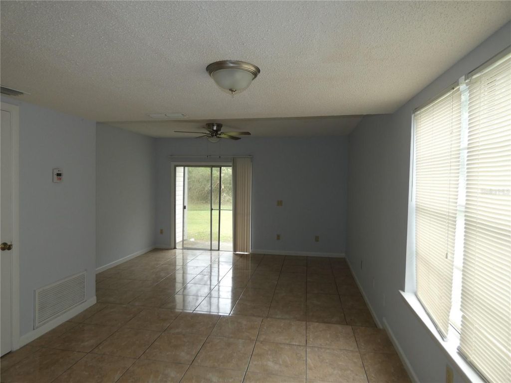 Photo of 12080 Mendel Drive, Orlando, FL 32826 (MLS # O6367710)