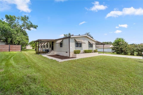 Photo of 5621 SW 64th Lane Road, Ocala, FL 34474 (MLS # OM733264)