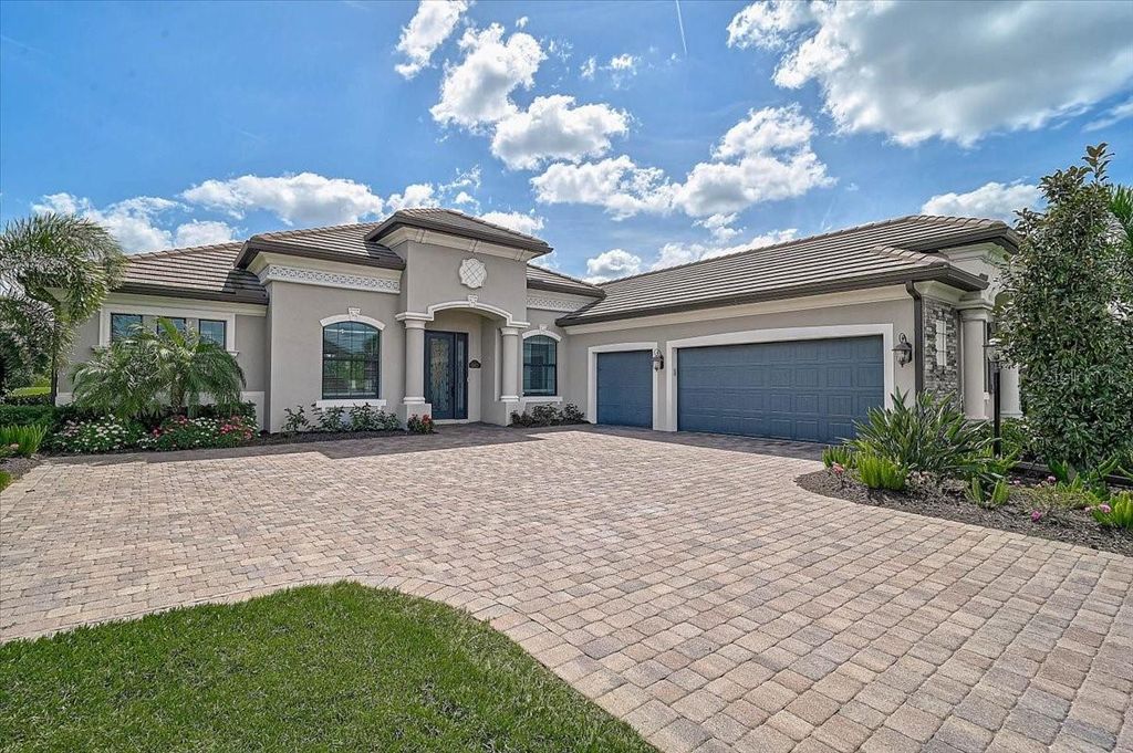 Photo of 5817 Mulligan Way, Bradenton, FL 34211 (MLS # A4687198)