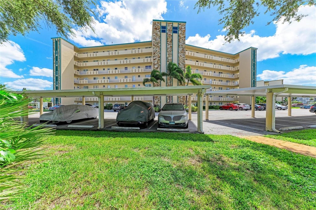Photo of 4040 Ironwood Circle #702F, Bradenton, FL 34209 (MLS # A4708314)