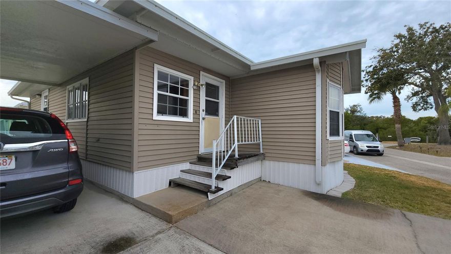 TWO BEDROOM, 1 1/2 BATHROOM MOBILE HOME IN ACTIVE 55+ COMMUNITY. This 800 Square ft., furnished home is just waiting for you to make it your own. A/C replaced in 2022, Single Carport, Metal Roofover. Spacious living and dining rooms. Second bedroom has an en suite half bath. The laundry room is large enough for extra guest sleeping options.  SUGAR CREEK COUNTRY CLUB CO-OP HAS LOW HOA FEES of just $600 quarterly which includes water, trash, sewer, basic cable, internet, and grass mowing. There is an active social calendar with fun activities and outings during the winter months. Enjoy this community's proximity to the Braden River and River Links Golf Course. Sorry this is not a dog lot.