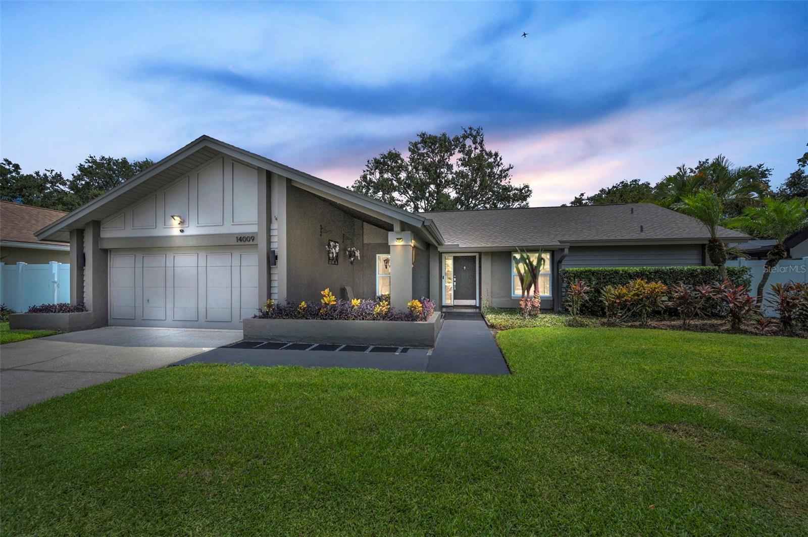 A Rare Carrollwood Village Gem — Fully Updated, Thoughtfully Designed, and Ready to Impress. Welcome to 14009 Middleton Way, where modern elegance, timeless comfort, and Florida lifestyle come together in perfect harmony. Tucked away on a quiet cul-de-sac in the heart of Carrollwood Village, this beautifully updated 5-bedroom, 3-bathroom pool home offers everything today’s discerning buyers are searching for—spacious interiors, quality upgrades, and an unbeatable location. From the moment you arrive, the pride of ownership is clear. The freshly painted exterior, mature landscaping, and inviting front entry set the tone for what lies inside: a warm, welcoming space designed for both everyday living and stylish entertaining. The fenced in backyard is secluded making hot summer afternoons or even cool winter nights the place to be. This is more than a home — it’s a lifestyle, right in one of Tampa’s most sought-after communities. Schedule your private tour today and experience the magic of Middleton Way for yourself. Fence 2024, gutters 2023, windows and sliding doors 2021, salt water pool pump 2023, exterior and interior paint 2025.