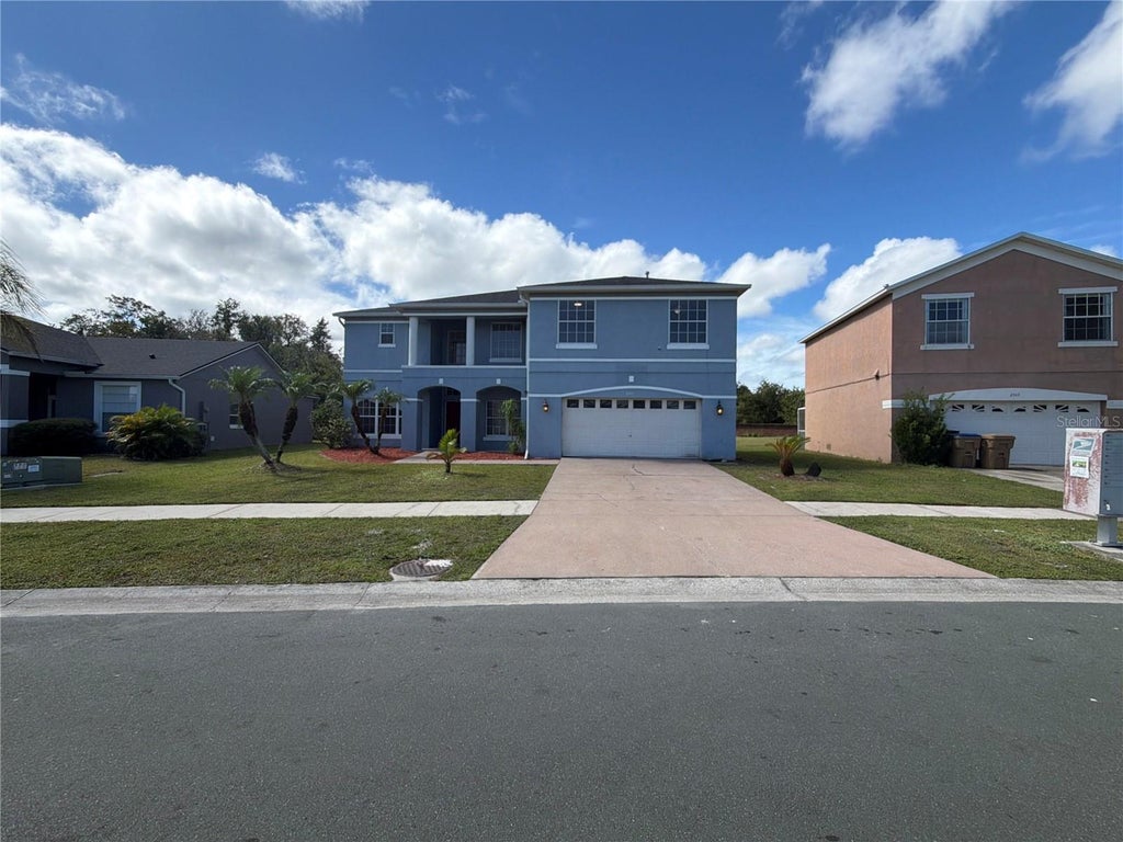 Photo of 2541 Jasmine Trace Drive, Kissimmee, FL 34758 (MLS # O6447009)