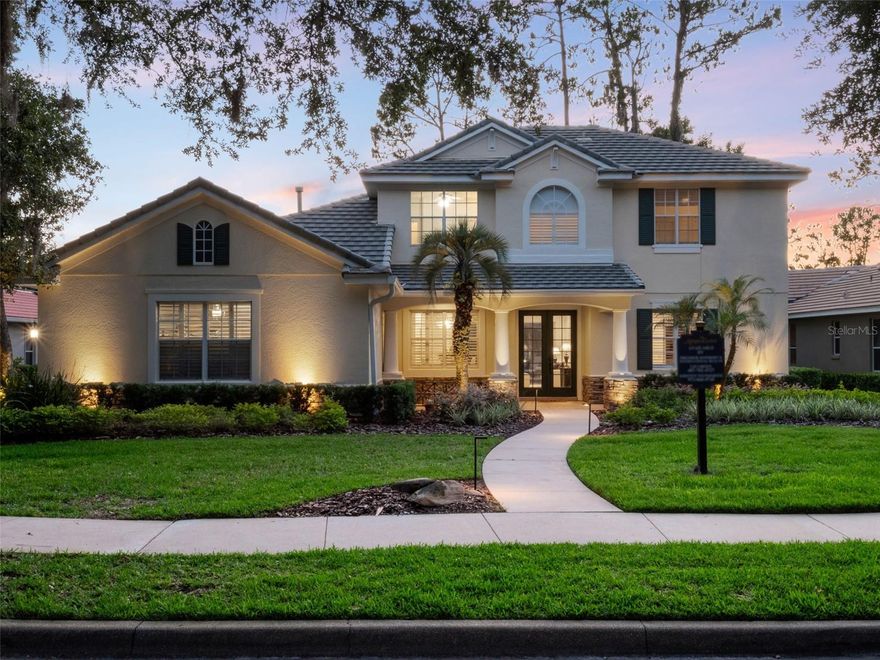 Brand new roof finished May 2025!!! Welcome to this exceptional home, set on one of the desirable lots in Alaqua Lakes with sweeping golf and water views, and stunning sunsets every evening. On a quiet cut-de-sac, this home offers timeless elegance, upscale finishes, and a classic, traditional floor plan, ideal for refined family living. The spacious primary suite is conveniently on the main floor, offering peaceful views and luxurious comfort. The additional bedrooms and bonus loft upstairs provide a retreat for family or guests. Step outside to your private outdoor sanctuary - complete with a resort-style pool and spa. Pool equipment including control panel, chlorinator, pump, gas heater, and lights were replaced in 2022. The patio pavers were pulled up and re-sanded in 2024. Also includes a new roof with May install. Alaqua Lakes is one of Central Florida's sought-after communities, offering unparalleled lifestyle with resort-style amenities, including a seven-acre park, five Har-Tru clay tennis courts, sand volleyball, playground, basketball and a stunning community pool. Golf enthusiasts will appreciate the proximity to the private Heathrow Legacy Golf & Country Club. Experience the ultimate in luxury, privacy and security, just minutes from upscale dining, top-rated schools, boutique shopping and major highways. You will not find better value in such a desirable community!